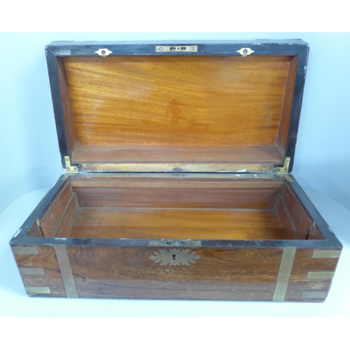 750 - A rosewood and brass bound box