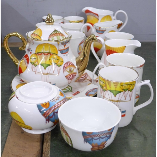 754 - James Dean pottery teaware and mugs decorated with hot air balloons