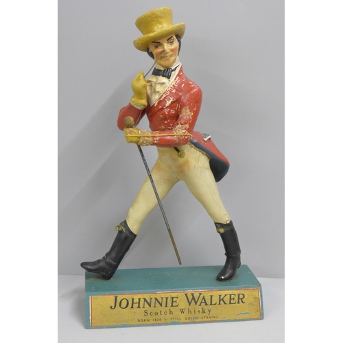 765 - A Johnnie Walker Scotch Whisky advertising figure, 40cm