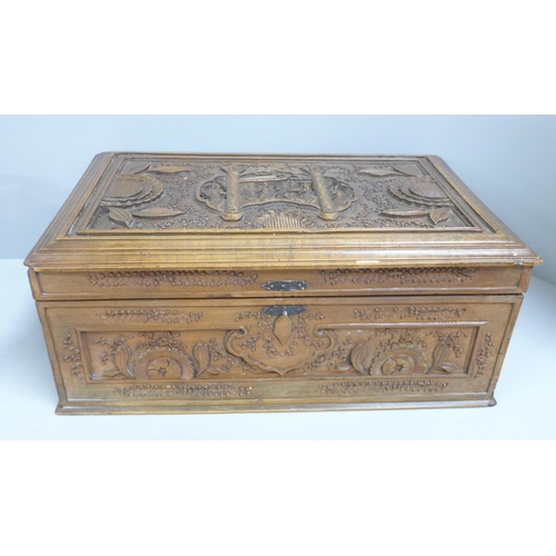 775 - A Chinese carved cedar box, 31.5cm x 21.5cm x 13cm