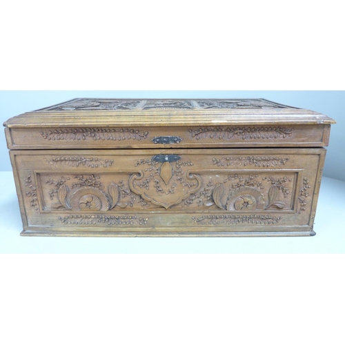 775 - A Chinese carved cedar box, 31.5cm x 21.5cm x 13cm