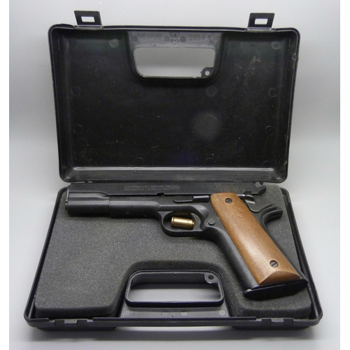 793 - An Italian automatic Bruni 96 8mm cal. target shooting pistol, cased