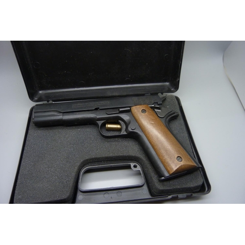 793 - An Italian automatic Bruni 96 8mm cal. target shooting pistol, cased