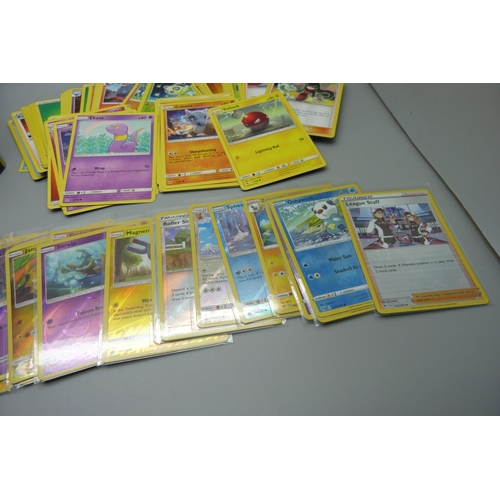 809 - 300 Common/uncommon/rare Pokemon cards and 30 reverse holo/holo cards