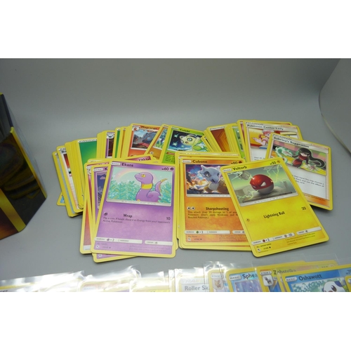 809 - 300 Common/uncommon/rare Pokemon cards and 30 reverse holo/holo cards