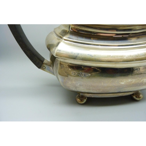 814 - A three piece Walker & Hall silver tea service, 1236g, (40oz.)