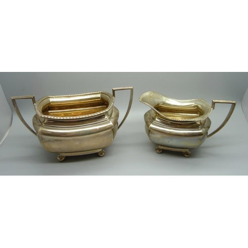 814 - A three piece Walker & Hall silver tea service, 1236g, (40oz.)