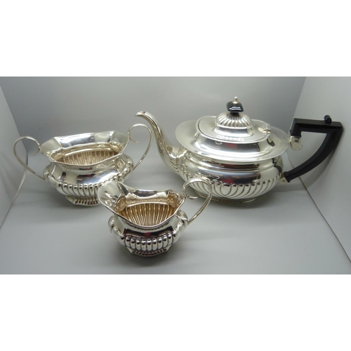 819 - A three piece electro plated tea service, (matched, 2+1)