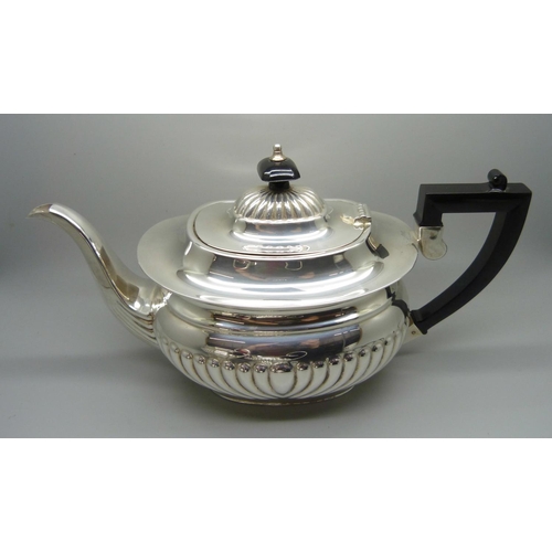 819 - A three piece electro plated tea service, (matched, 2+1)