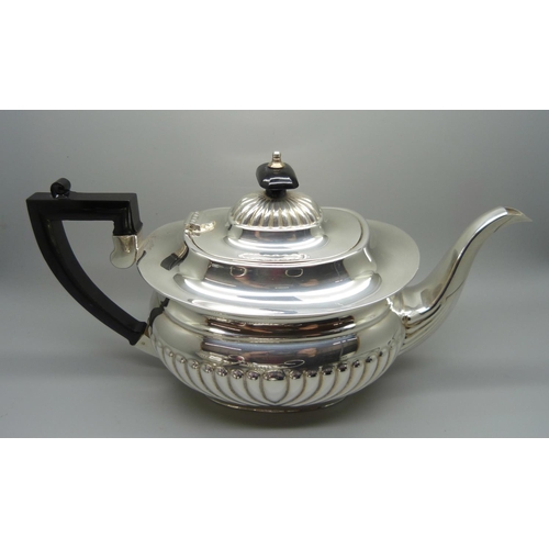 819 - A three piece electro plated tea service, (matched, 2+1)