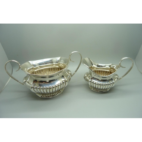 819 - A three piece electro plated tea service, (matched, 2+1)