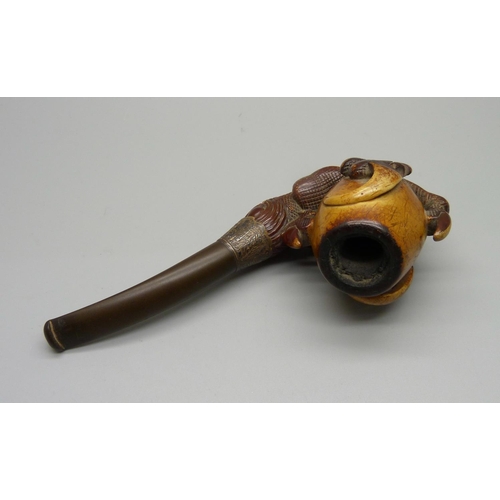 825 - A Victorian Meerschaum pipe, carved as a dragon's claw grasping a pearl of wisdom, silver mount date... 