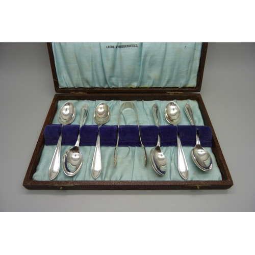 843 - A cased set of six silver coffee spoons with sugar bows, Sheffield 1948, 80g