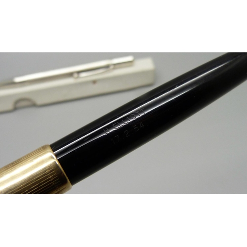 850 - A vintage Valentine Bakelite pen with original label and 14ct gold nib, a Parker fountain pen and pr... 