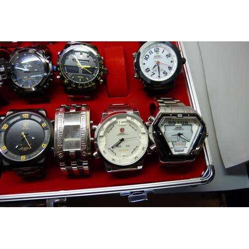 877 - A collection of wristwatches, WEiDE and Shark, in a metal case, (20), WEiDE watches with button oper... 