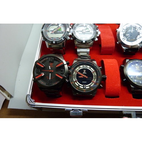 877 - A collection of wristwatches, WEiDE and Shark, in a metal case, (20), WEiDE watches with button oper... 