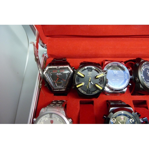 878 - A collection of wristwatches, WEiDE and Shark, in a metal case, (20), WEiDE watches with button oper... 