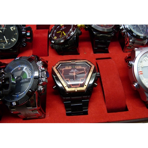 878 - A collection of wristwatches, WEiDE and Shark, in a metal case, (20), WEiDE watches with button oper... 