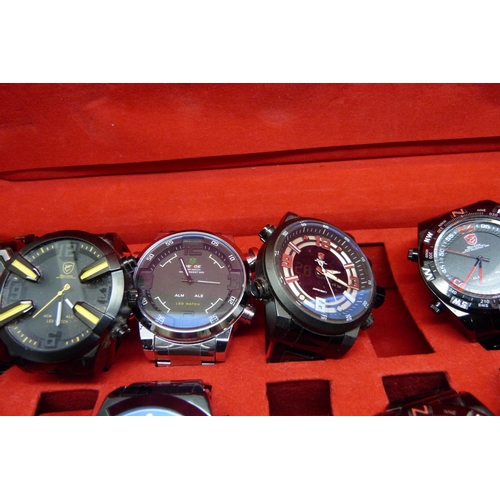 878 - A collection of wristwatches, WEiDE and Shark, in a metal case, (20), WEiDE watches with button oper... 