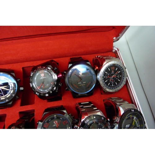 878 - A collection of wristwatches, WEiDE and Shark, in a metal case, (20), WEiDE watches with button oper... 