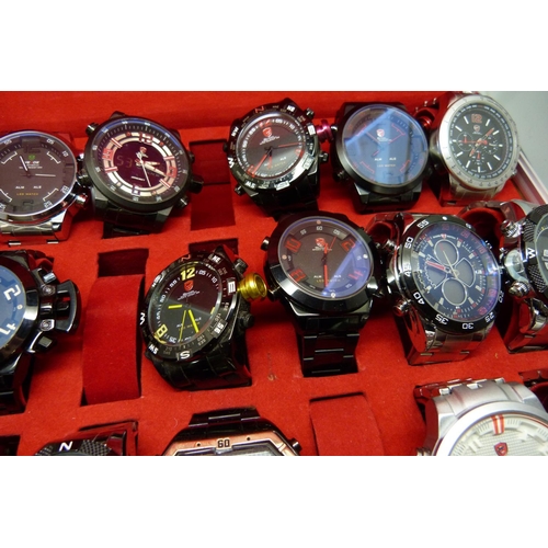 878 - A collection of wristwatches, WEiDE and Shark, in a metal case, (20), WEiDE watches with button oper... 