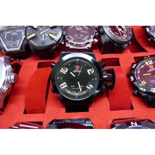 878 - A collection of wristwatches, WEiDE and Shark, in a metal case, (20), WEiDE watches with button oper... 