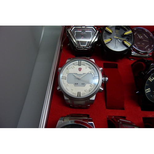 878 - A collection of wristwatches, WEiDE and Shark, in a metal case, (20), WEiDE watches with button oper... 