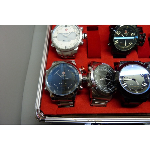 878 - A collection of wristwatches, WEiDE and Shark, in a metal case, (20), WEiDE watches with button oper... 