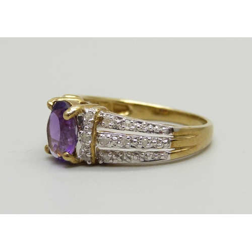 897 - A 9ct gold, amethyst and twenty stone diamond ring, 2.7g, N