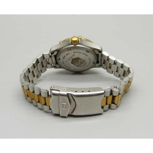 909 - A lady's Tag Heuer wristwatch