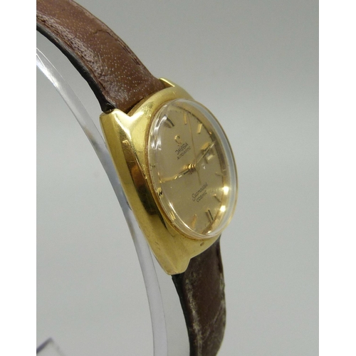 917 - A lady's 18ct gold Omega Seamaster Cosmic date wristwatch with second sweep hand, gross weight 27.8g... 