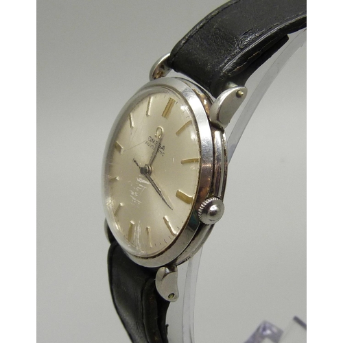 921 - An Omega automatic wristwatch with teardrop lugs, (replacement crown), 31mm case