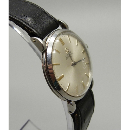 921 - An Omega automatic wristwatch with teardrop lugs, (replacement crown), 31mm case