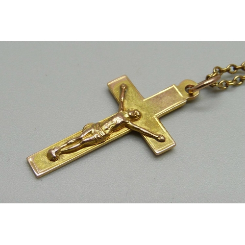 933 - A 9ct gold crucifix on a 9ct gold chain, 5.8g