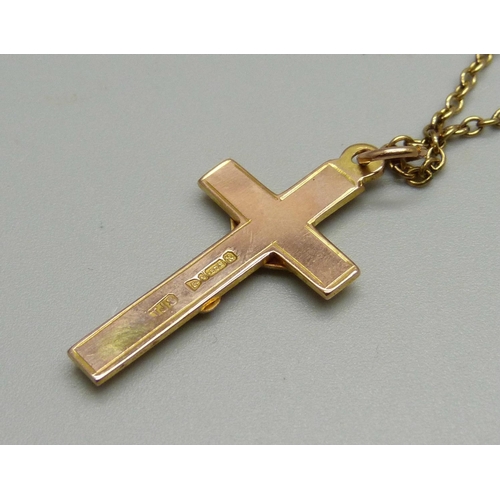 933 - A 9ct gold crucifix on a 9ct gold chain, 5.8g