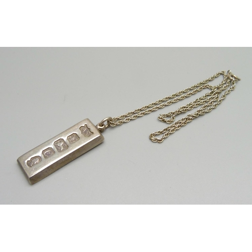 938 - A silver ingot pendant on a .925 silver chain, 35.4g