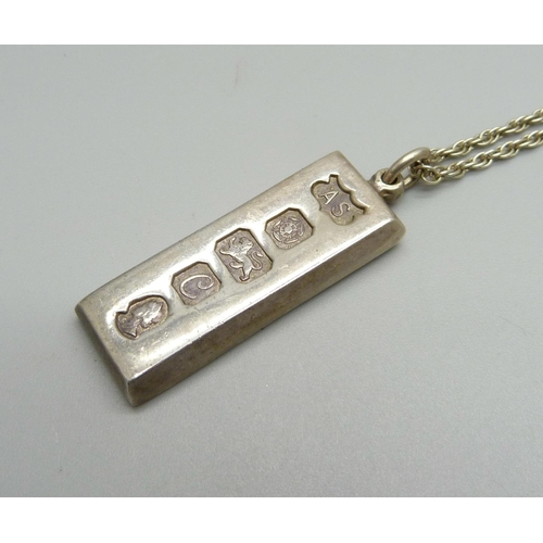 938 - A silver ingot pendant on a .925 silver chain, 35.4g