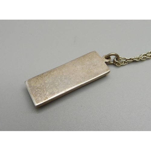 938 - A silver ingot pendant on a .925 silver chain, 35.4g