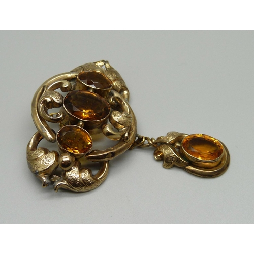 952 - A late Victorian brooch set with citrine, pin repaired