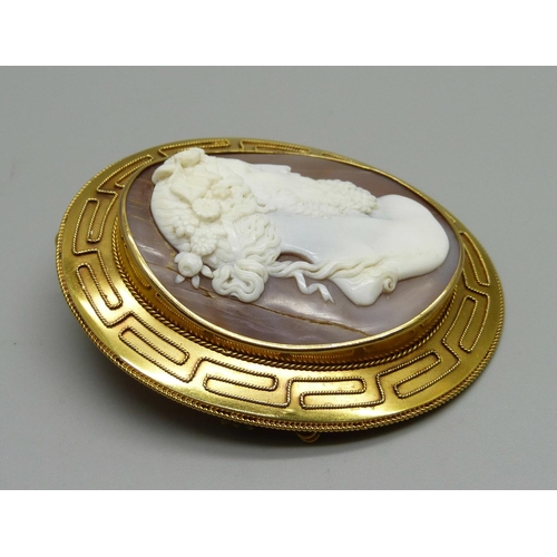 953 - A circa 1900 yellow metal mounted cameo brooch, cameo a/f, 54mm wide