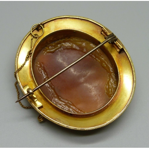 953 - A circa 1900 yellow metal mounted cameo brooch, cameo a/f, 54mm wide