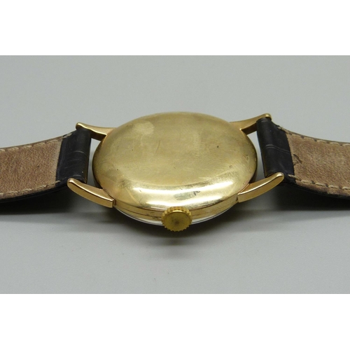 955 - A 9ct gold Movado wristwatch