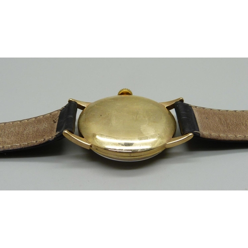 955 - A 9ct gold Movado wristwatch