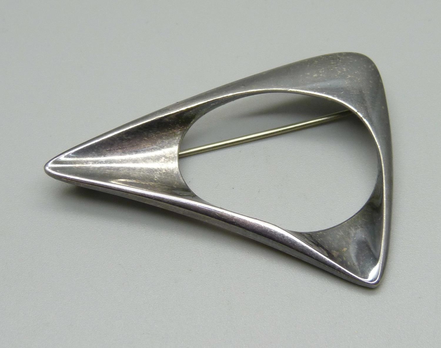 A Georg Jensen silver brooch, marked 375, designed by Henning Koppel