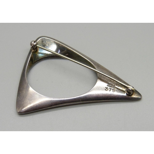 960 - A Georg Jensen silver brooch, marked 375, designed by Henning Koppel