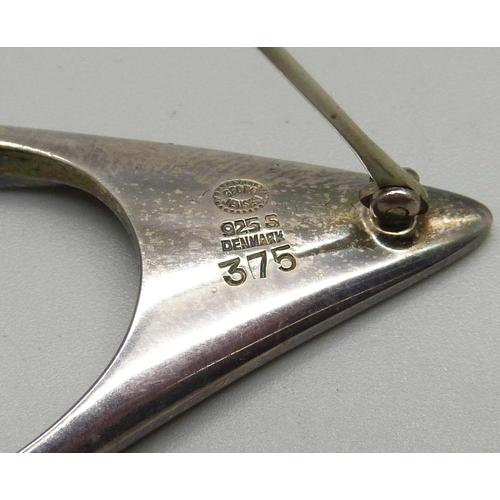 960 - A Georg Jensen silver brooch, marked 375, designed by Henning Koppel