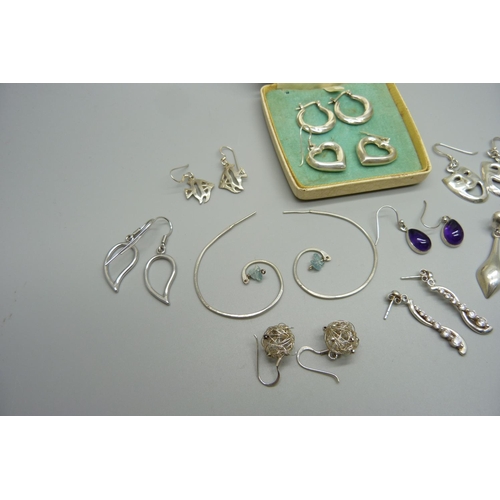 973 - Ten pairs of silver earrings