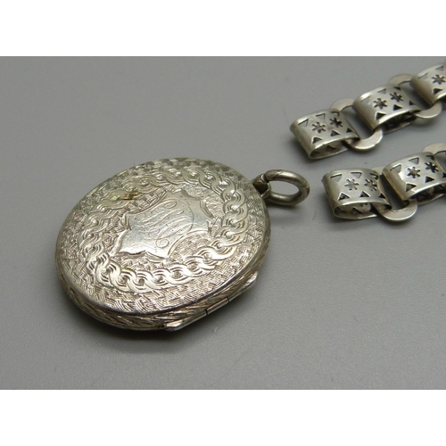 984 - A Victorian silver locket and a chain/collar lacking fasteners