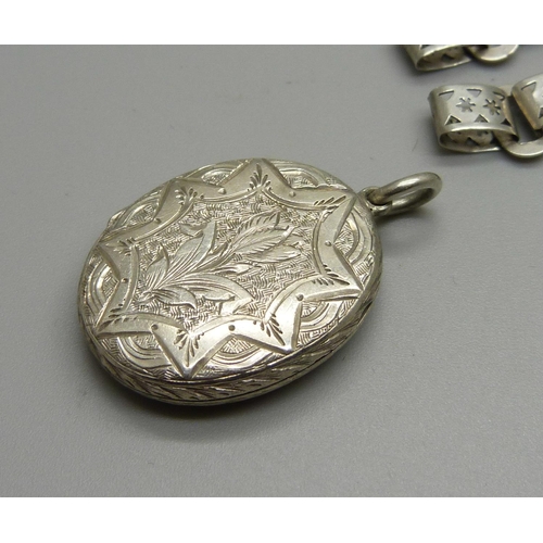 984 - A Victorian silver locket and a chain/collar lacking fasteners