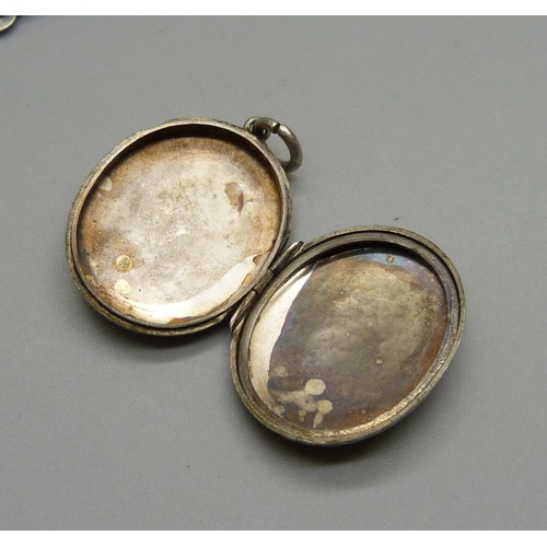 984 - A Victorian silver locket and a chain/collar lacking fasteners